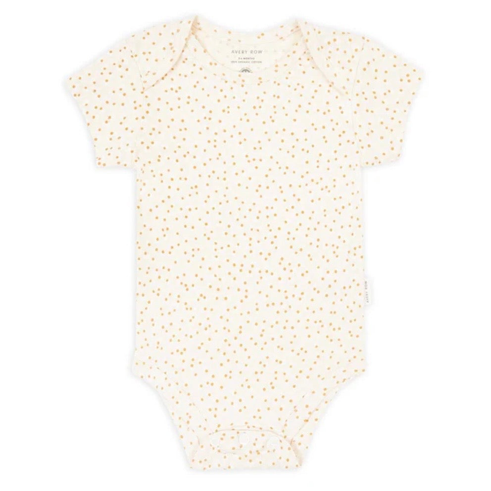 Baby onesie with small floral pattern on a white background