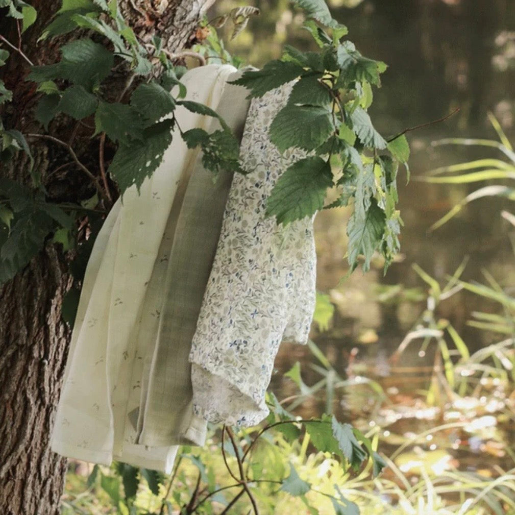 Muslin squares drapedovver a tree