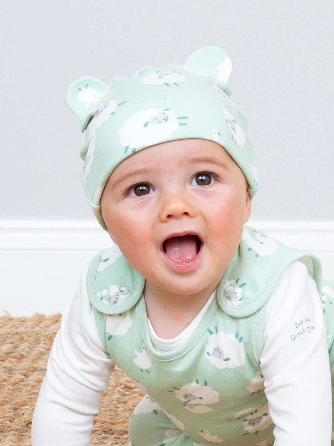 Baby wearing our Sheep Hat, a fun new baby present!