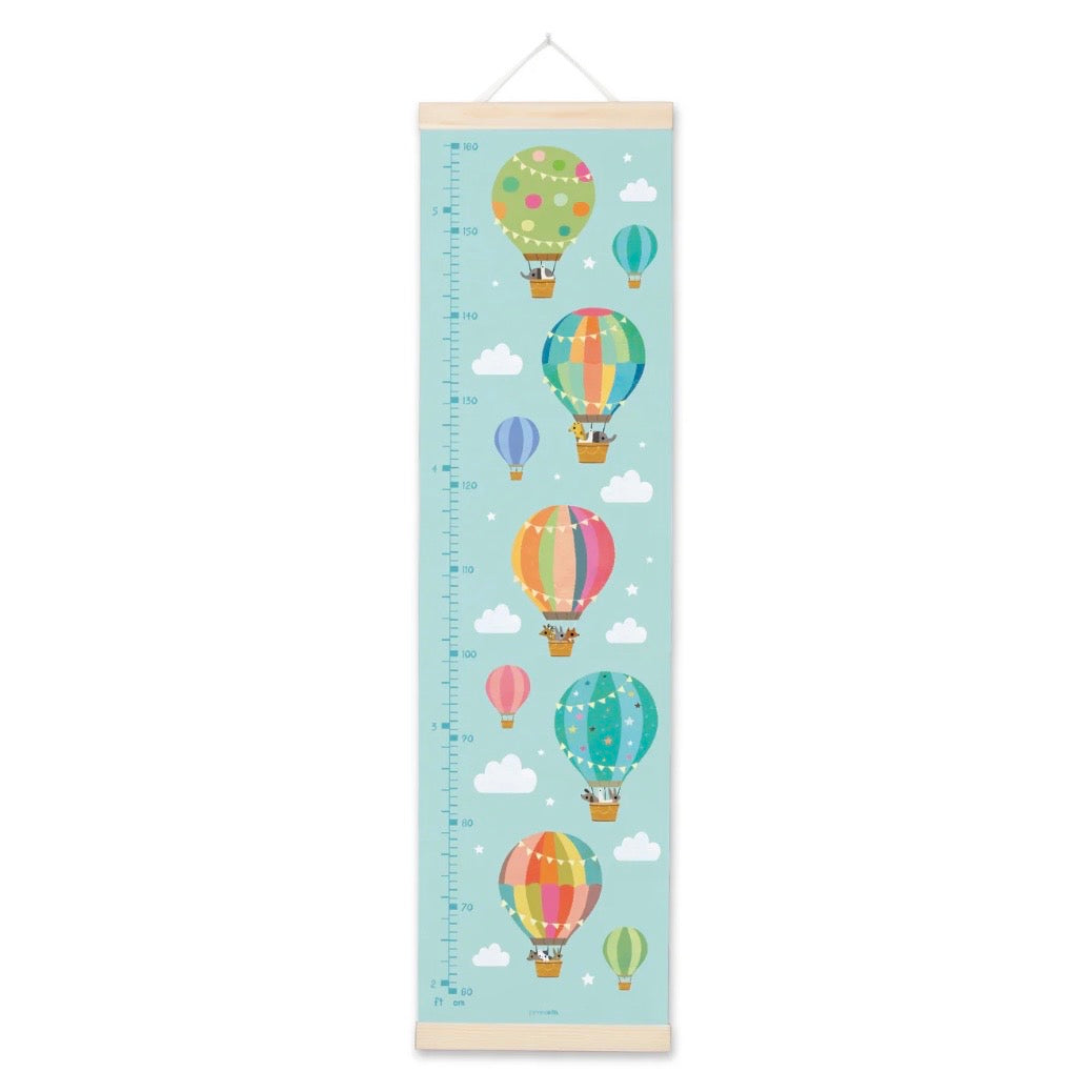 Growth chart with colorful hot air balloons on a light blue background