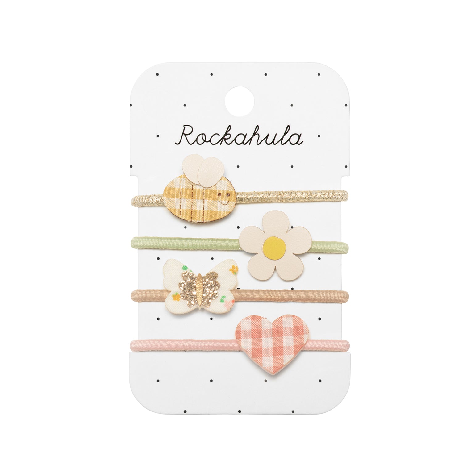 Set of hairbands with decorative clips on a Rockahula branded card.