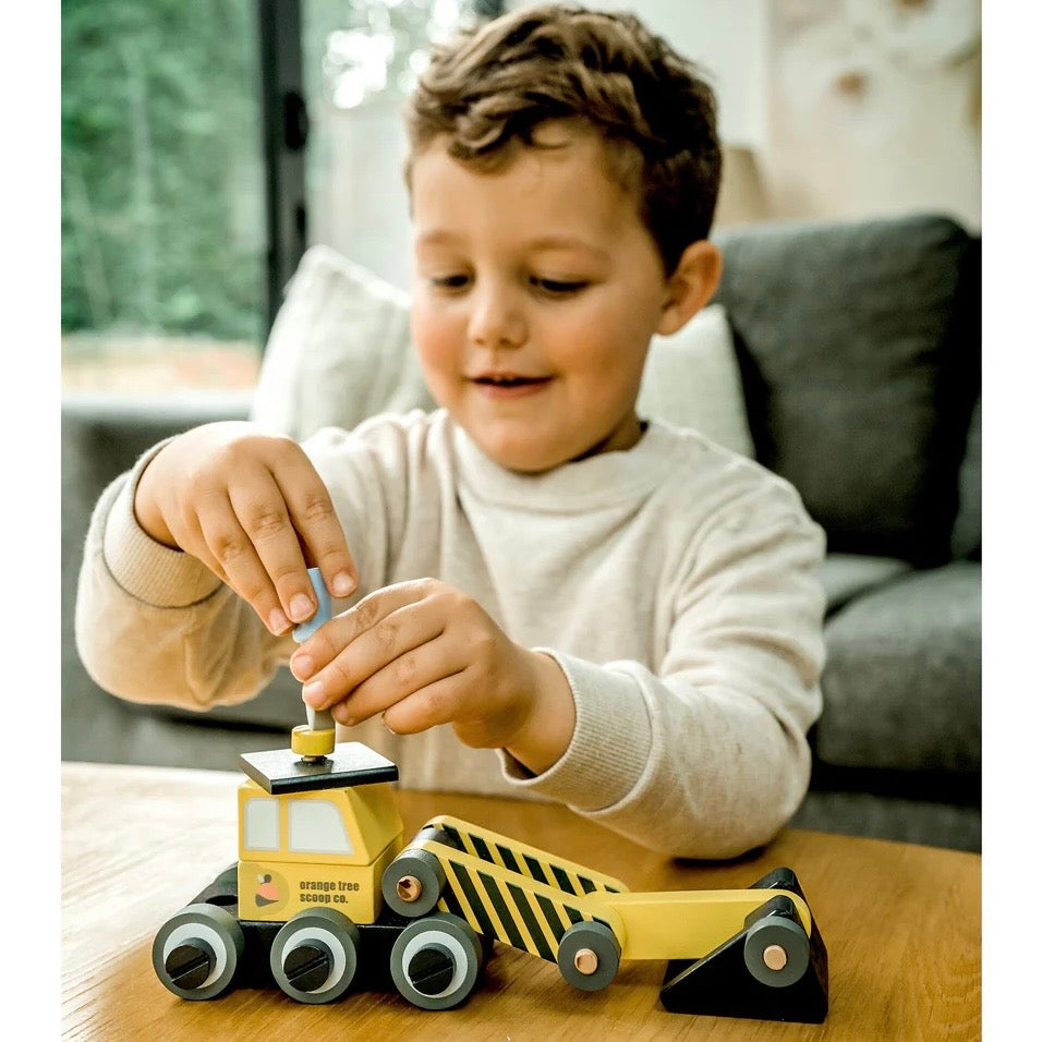 Child playing with out Buildable Digger
Wooden toy 