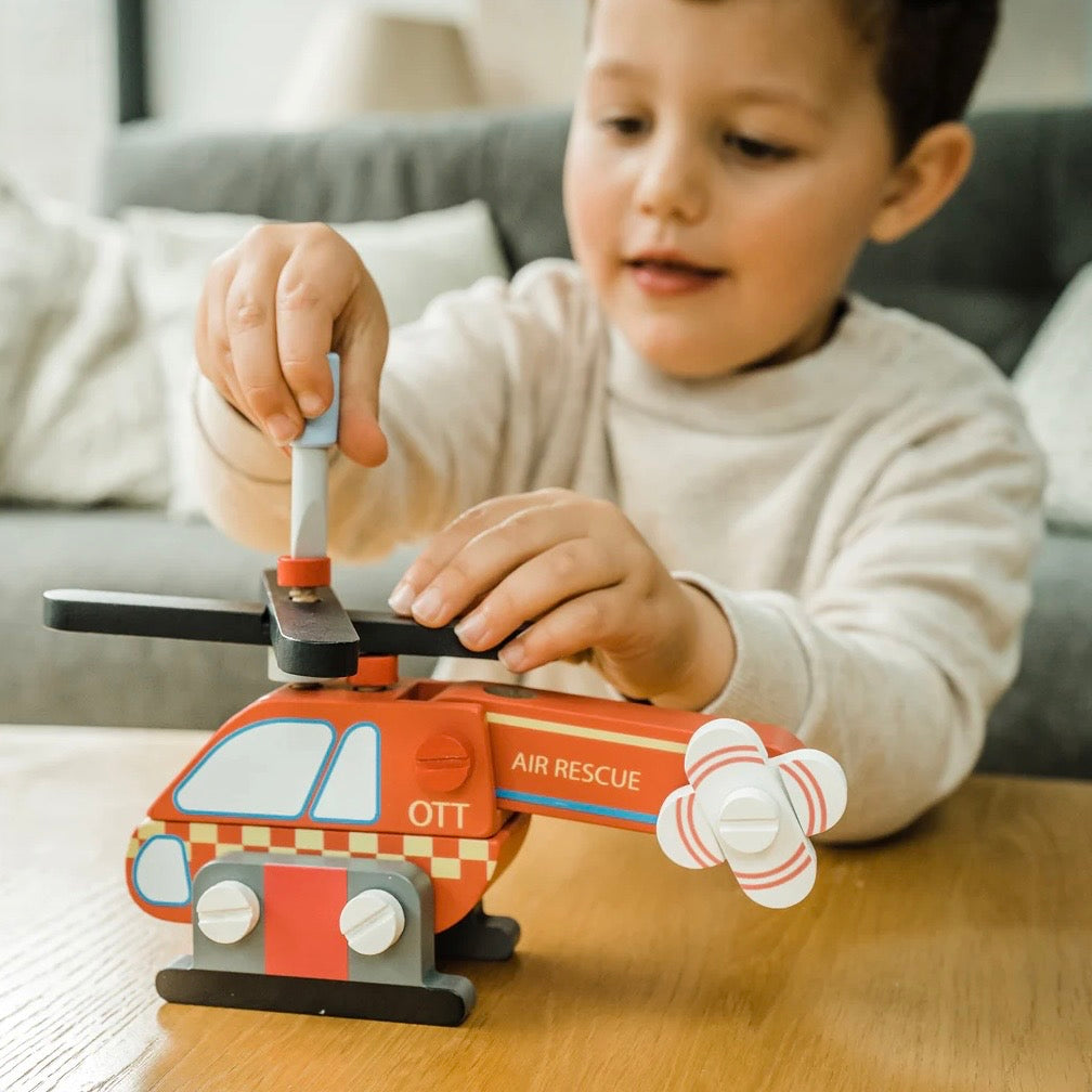 Children can assemble the helicopter piece by piece, then swoop into rescue missions once it’s built
