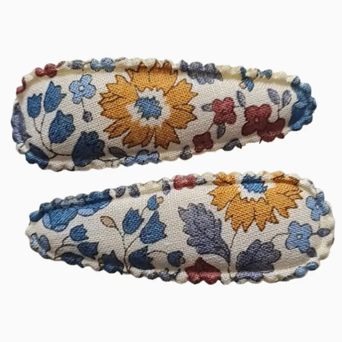 Two fabric-covered hairpins with a floral pattern on a white background.
Hair Clips
Liberty Print
Gift inspiration 
Floral
Girls Hair Accessories