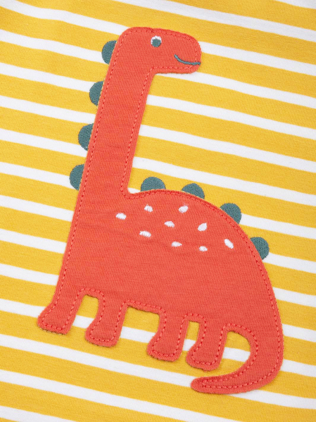 Close up on our boys striped dinosaur appliqué t-shirt 