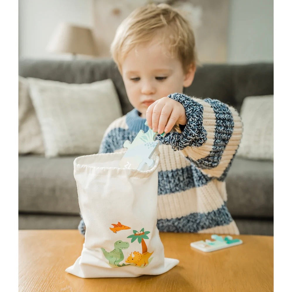 Tidy away our Dinosaur Number Puzzle into the handy cotton drawstring bag 