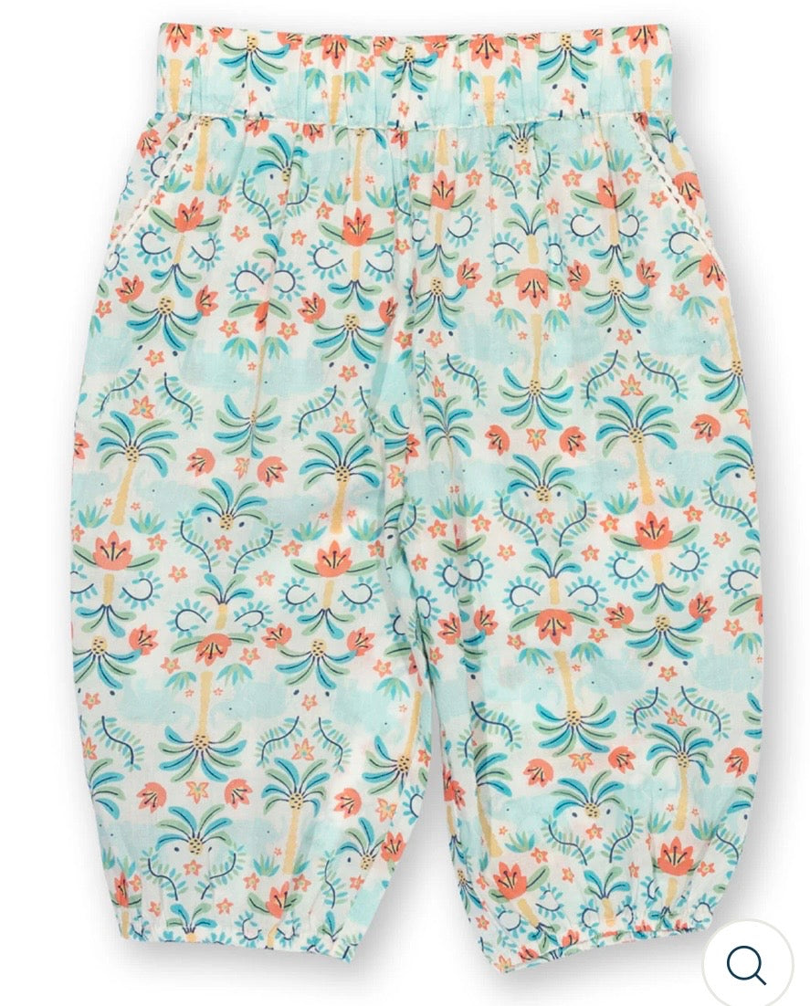 Floral-patterned pants with palm trees on a light blue background

Lightweight material 
Kite Clothing 
Children's clothing 
Pull Ups 
Trousers
Organic Cotton