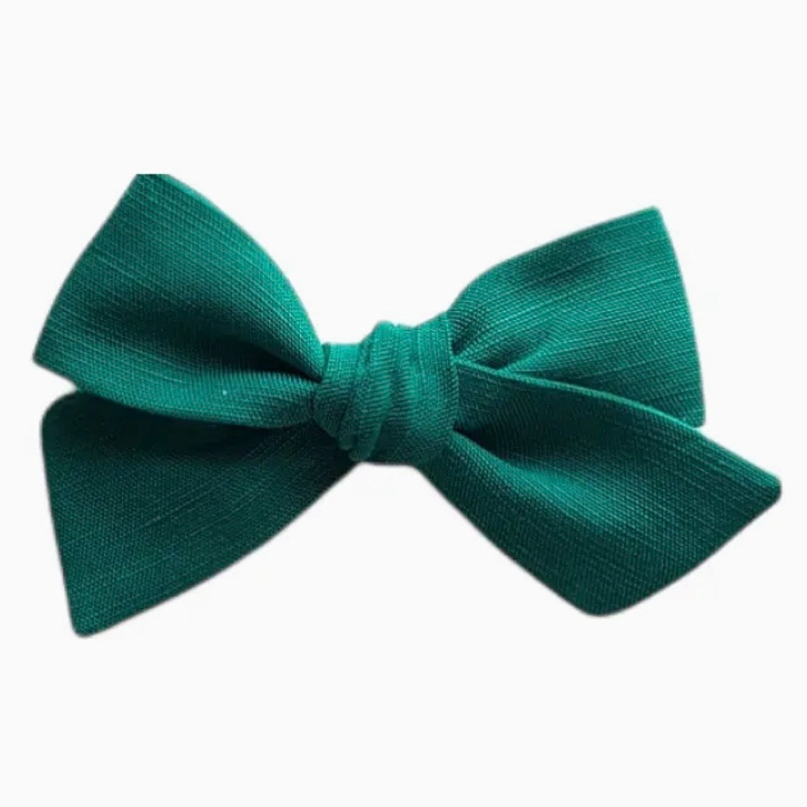 A classic pre-tied bow tie in a rich emerald green color, displayed against a clean white background.

Hair Clips
Liberty Print
Gift inspiration 
Floral
Girls Hair Accessories