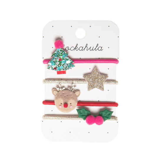 Set of Christmas-themed hair accessories on aockahula branded card