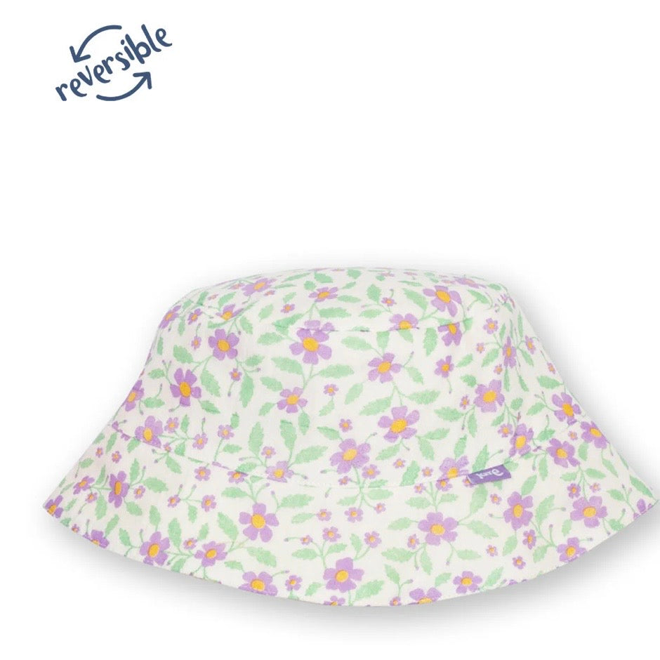 A reversible sun hat with a delicate floral print featuring purple flowers, yellow centers, and green leaves on a white background, shown on a plain white background with a 'reversible' label overlay in the top left

Childrens hat
Sun hat 
Kids clothing 
Floral print
