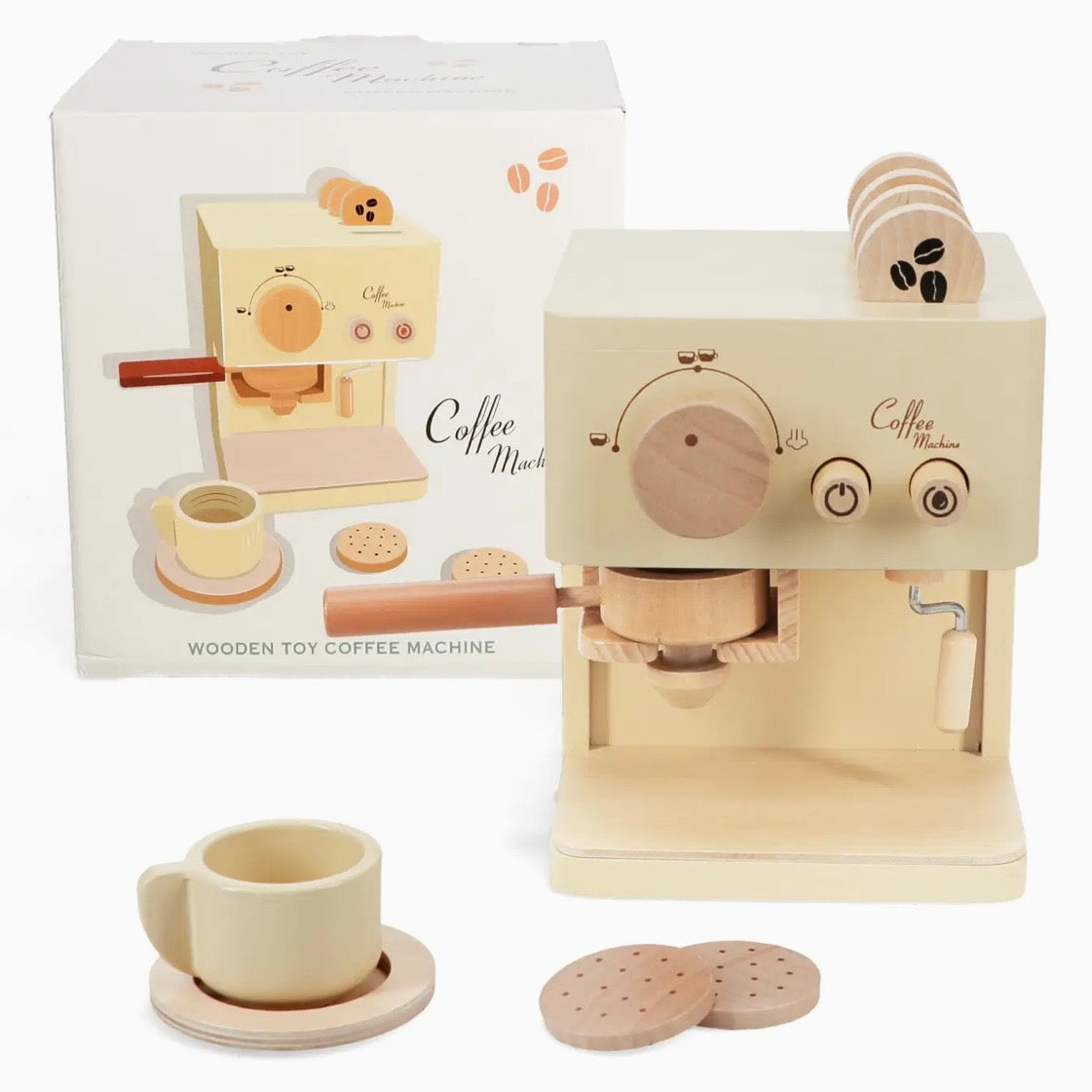 A wooden toy coffee machine set with a cream-coloured espresso machine, matching cup and saucer, round wooden coffee beans, and two cookies, shown alongside its illustrated product box on a white background.

pretend coffee shop, barista role play, kitchen playset, imaginative play, cafe toy, wooden play kitchen accessory, pretend drinks toy, portafilter toy, biscotti toy, hand-eye coordination toy