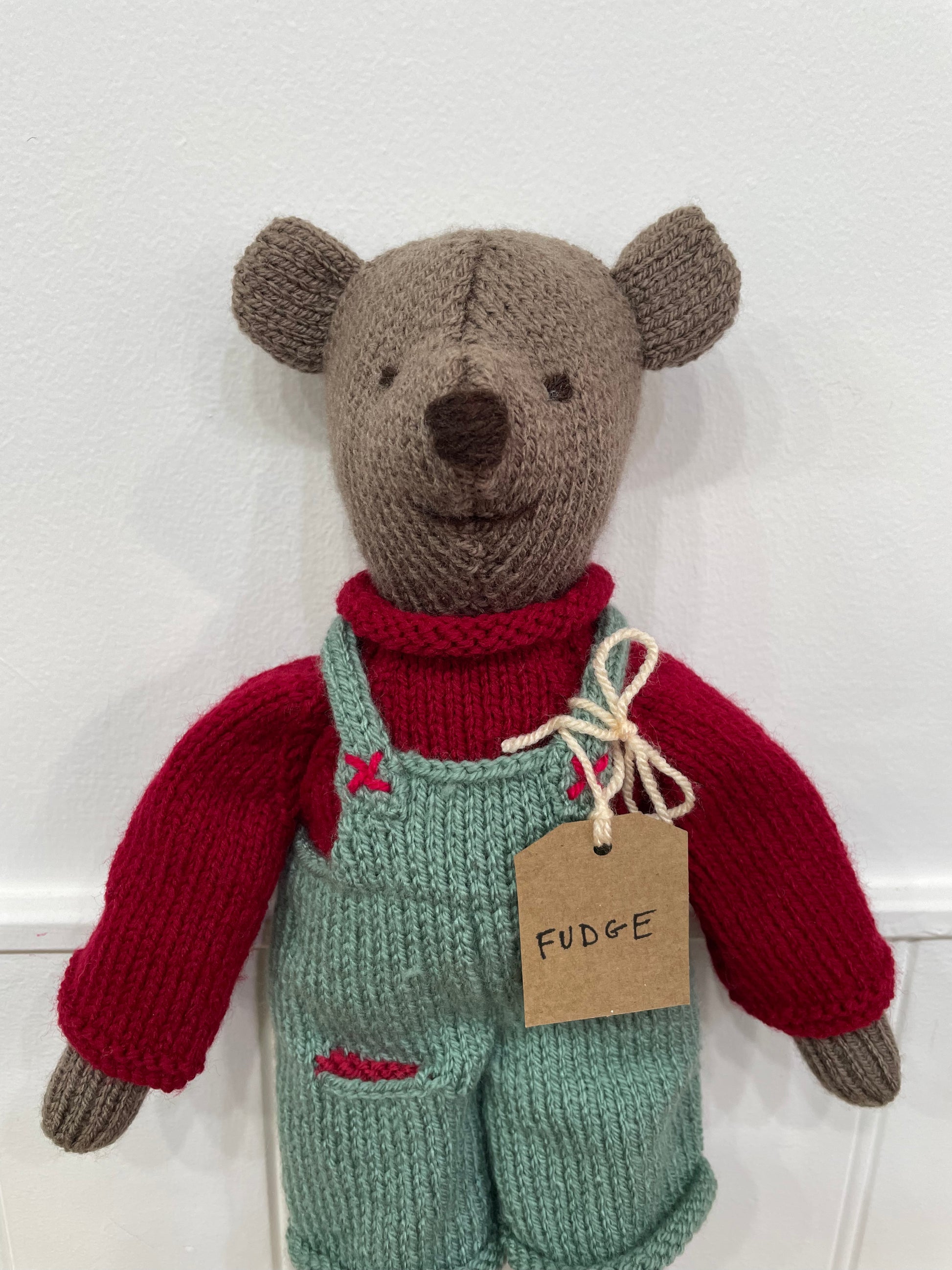 Locally hand knitted in South Oxfordshire. 
Soft toy Fudge 