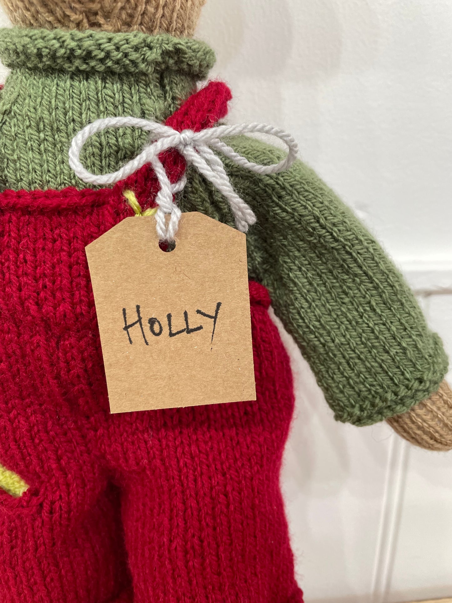 Hand knitted soft toy names Holly 
Handmade in South Oxfordshire 