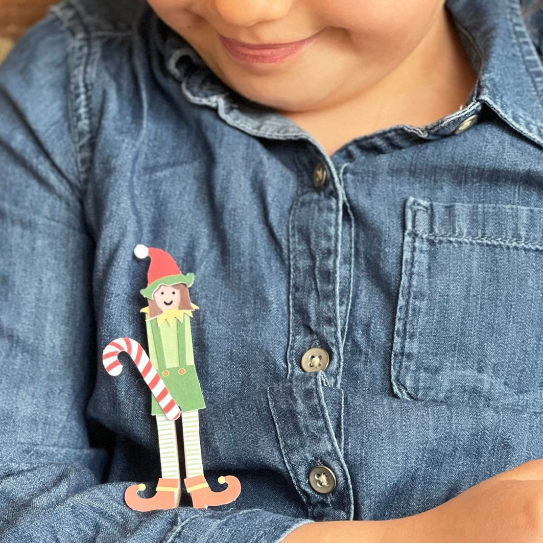 Lifestyle image showing made up elf peg doll. 