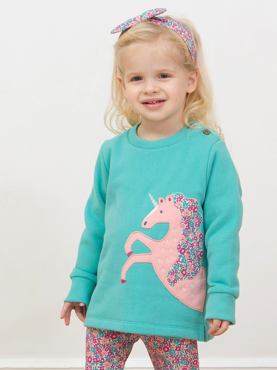 Child wearing our Merhorse Sweatshirt with matching Ditsy Tales Leggings
Made from organic cotton 