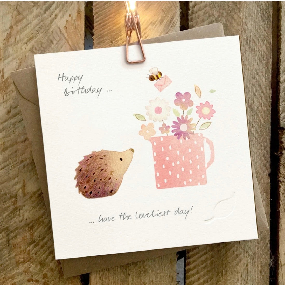 Birthday card with a hedgehog and vase full of flowers. 

Ginger Betty Cards
Birthday Cards
Hedgehog 
Bee
Printed in the UK