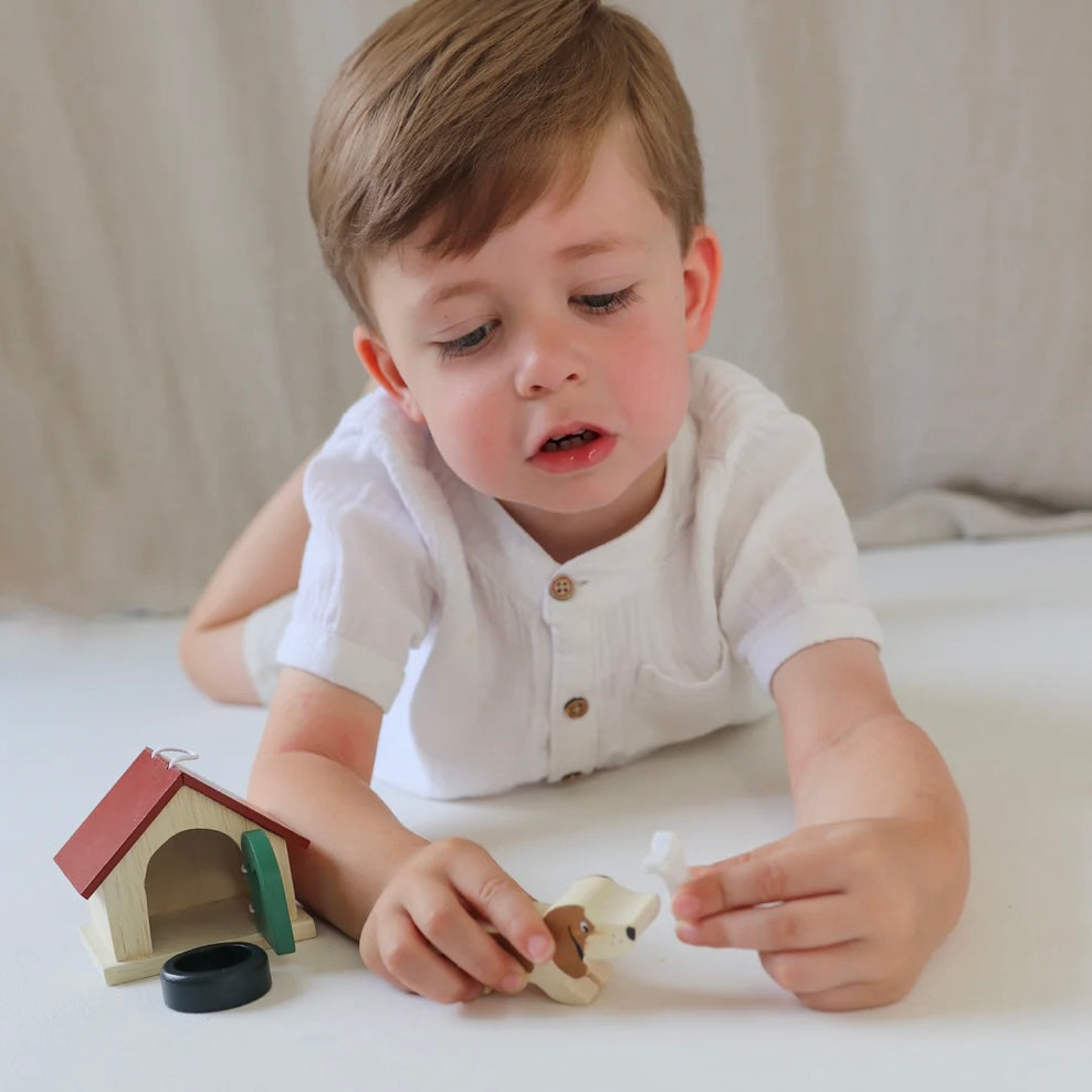 Child playing with our Pet Dog Play Set
Plastic free
