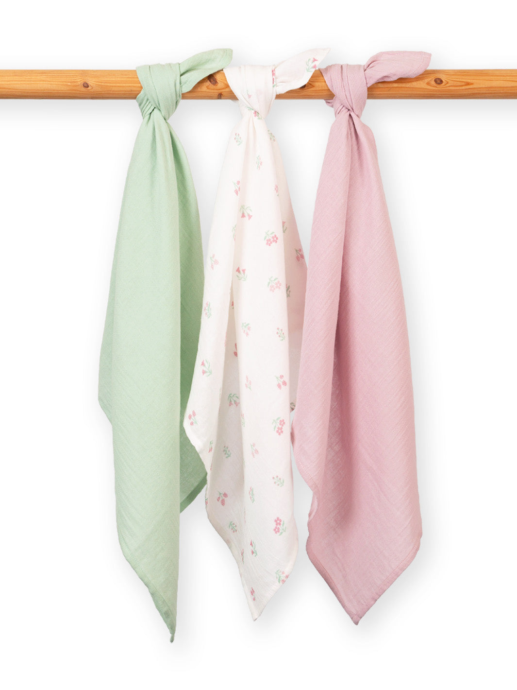 Set of three lightweight fabric scarves tied to a wooden rod against a white background: one sage green, one white with small pink floral print, and one dusty pink.

Muslins
New baby gifts
New arrivals 
Kite clothing 
