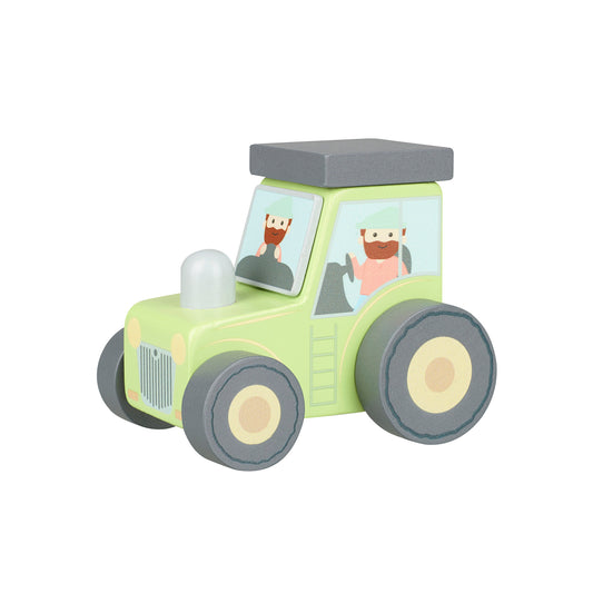 A green and beige wooden push along tractor toy with a cartoon face on the front.