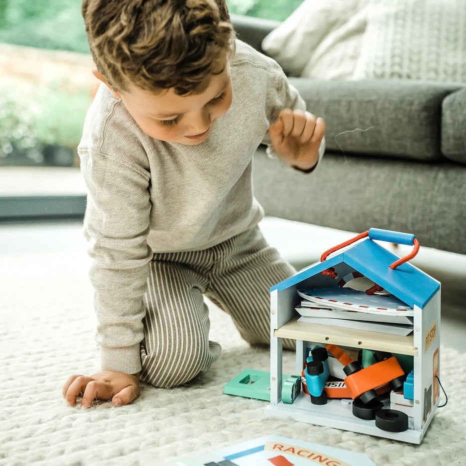 Image shows how the Racing Track Play Set all packs back inside for a clever design!