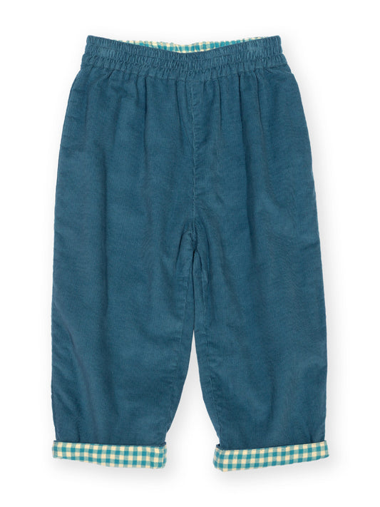 A pair of toddler's blue corduroy pants with a green and white gingham check lining at the cuffs and waistband, shown flat on a white background.

Organic cotton
Reversible 
Check
GOTS Certified 
Boys clothing
Gender neutral clothing 
Children's clothing 
