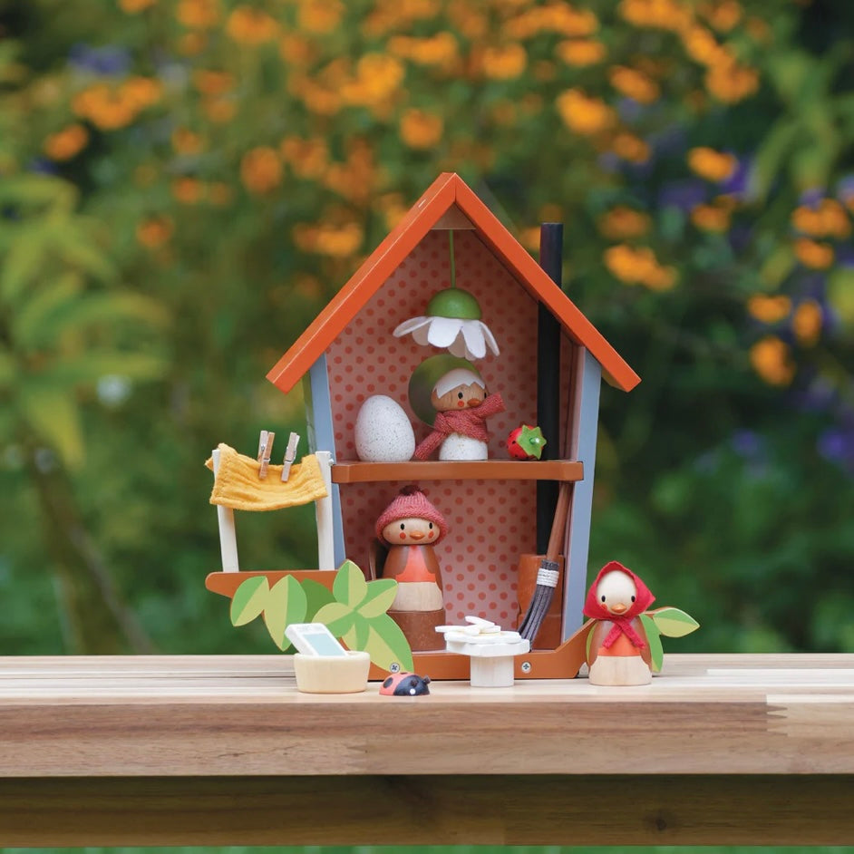 Robins Nest Box shown in a woodland setting 
Perfect gift for storytelling children 