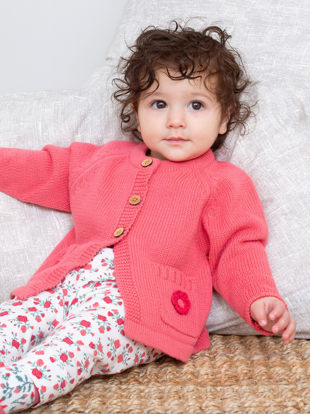Baby wearing our rose cardigan 