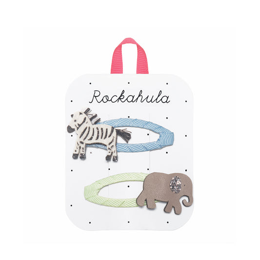 Set of hair clips with zebra and elephant designs on a Rockahula branded card.