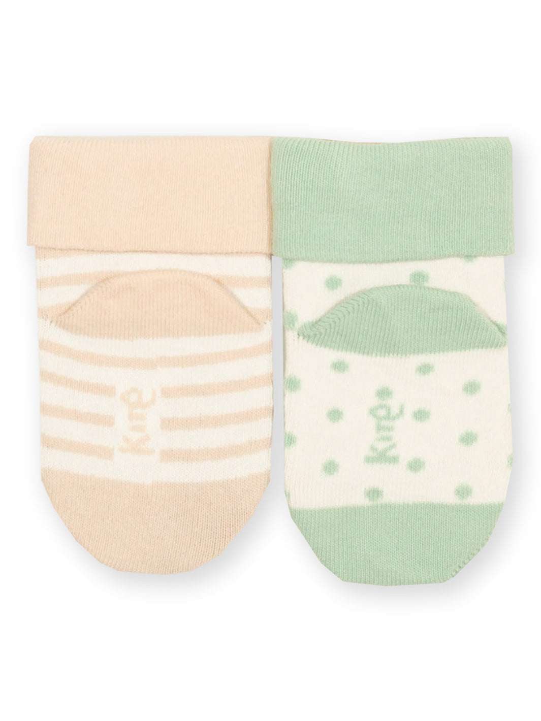 Pair of baby socks with beige and green patterns on a white background