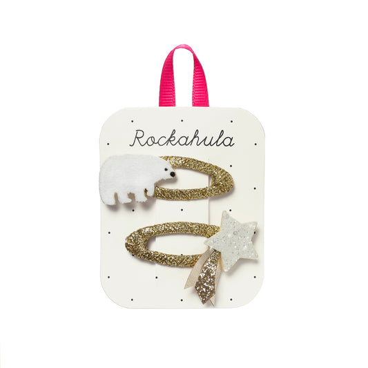 Set of two polar bear hair clips. Displayed on a card