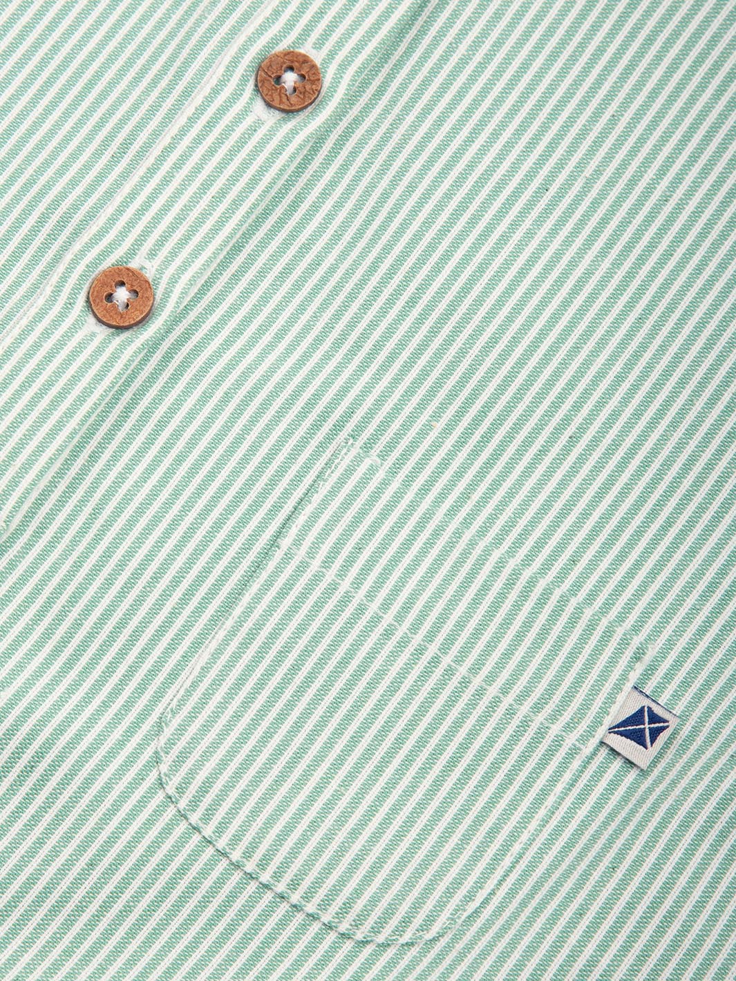 Close-up of a green striped shirt with buttons and Kite clothing brand logo.

Baby clothing 
Dungarees
Romper
Stripes
Organic cotton 
GOTS Certified fabrics 
New baby gift
Baby shower
Kite clothing 