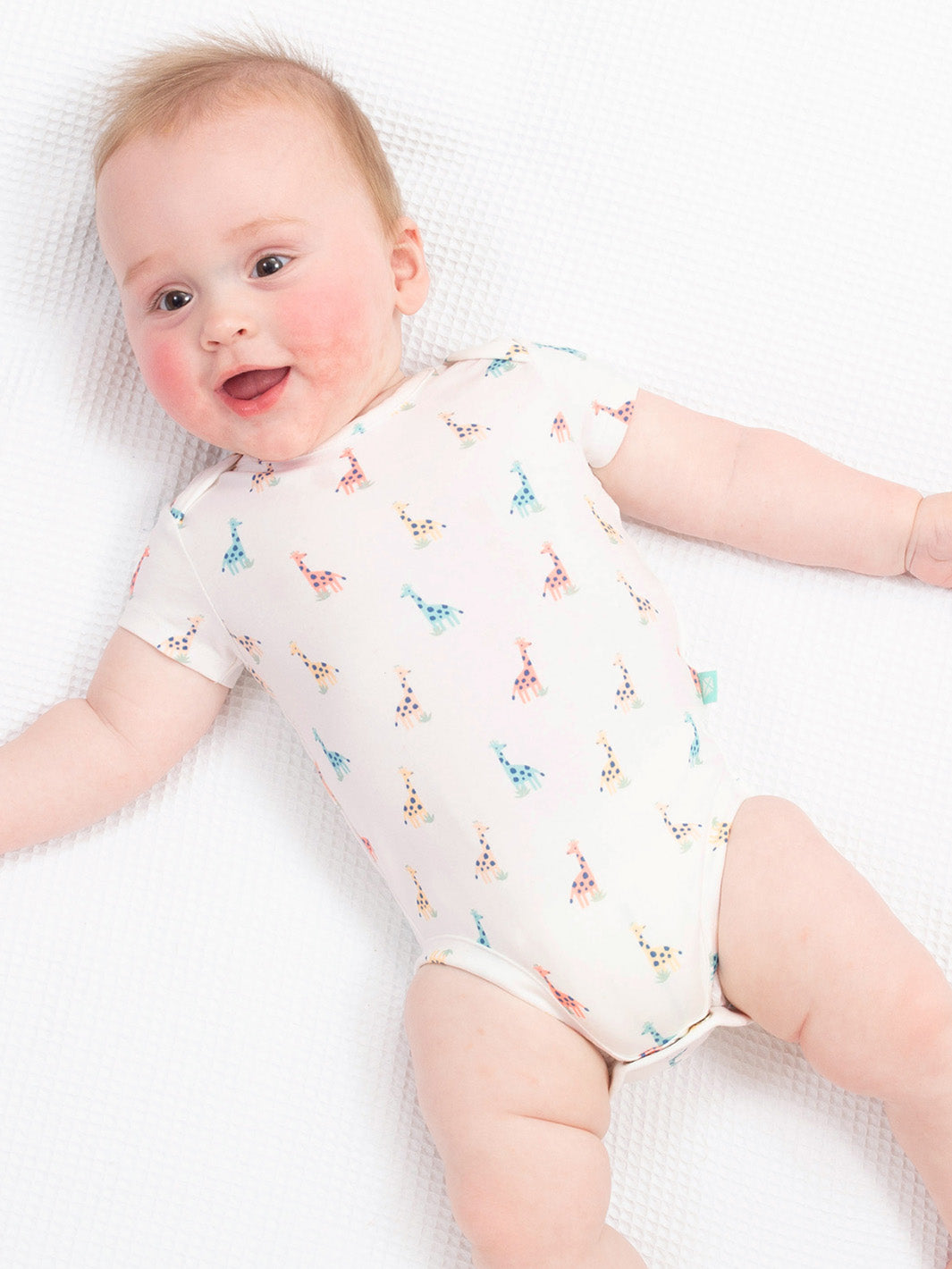 Bodysuit
Baby clothing
New baby clothing 
Giraffe 
Organic cotton 
GOTS Certified fabrics 
Kite clothing 