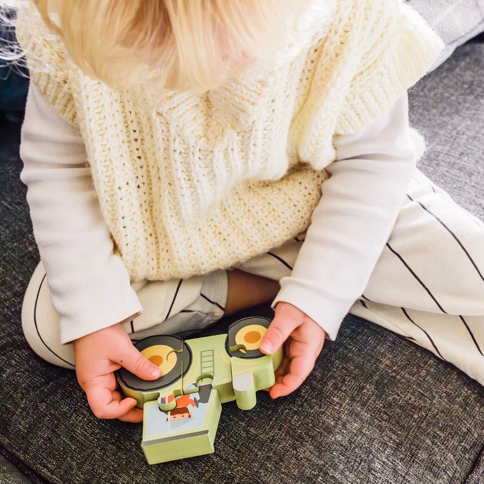 Child playing with our wooden Tractor Mini Puzzle

A lovely token gift for toddlers 