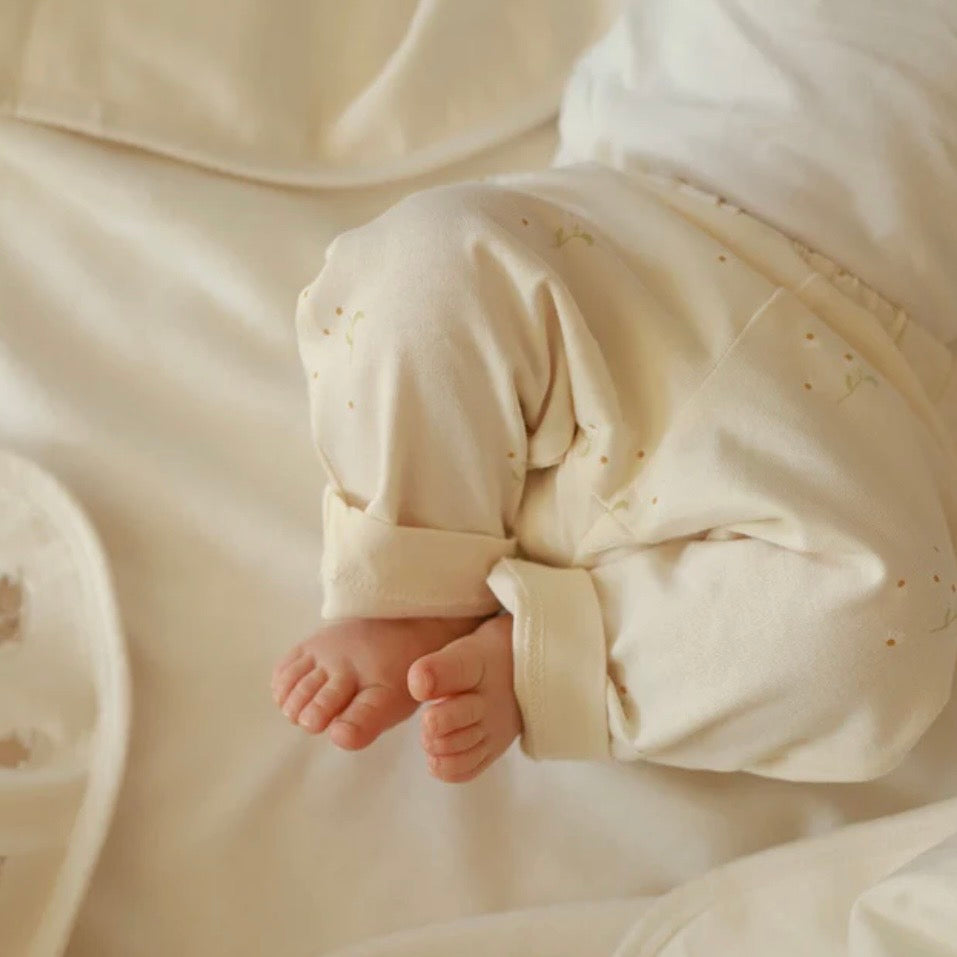 Our Wild Chamomile Leggings being modelled by a baby