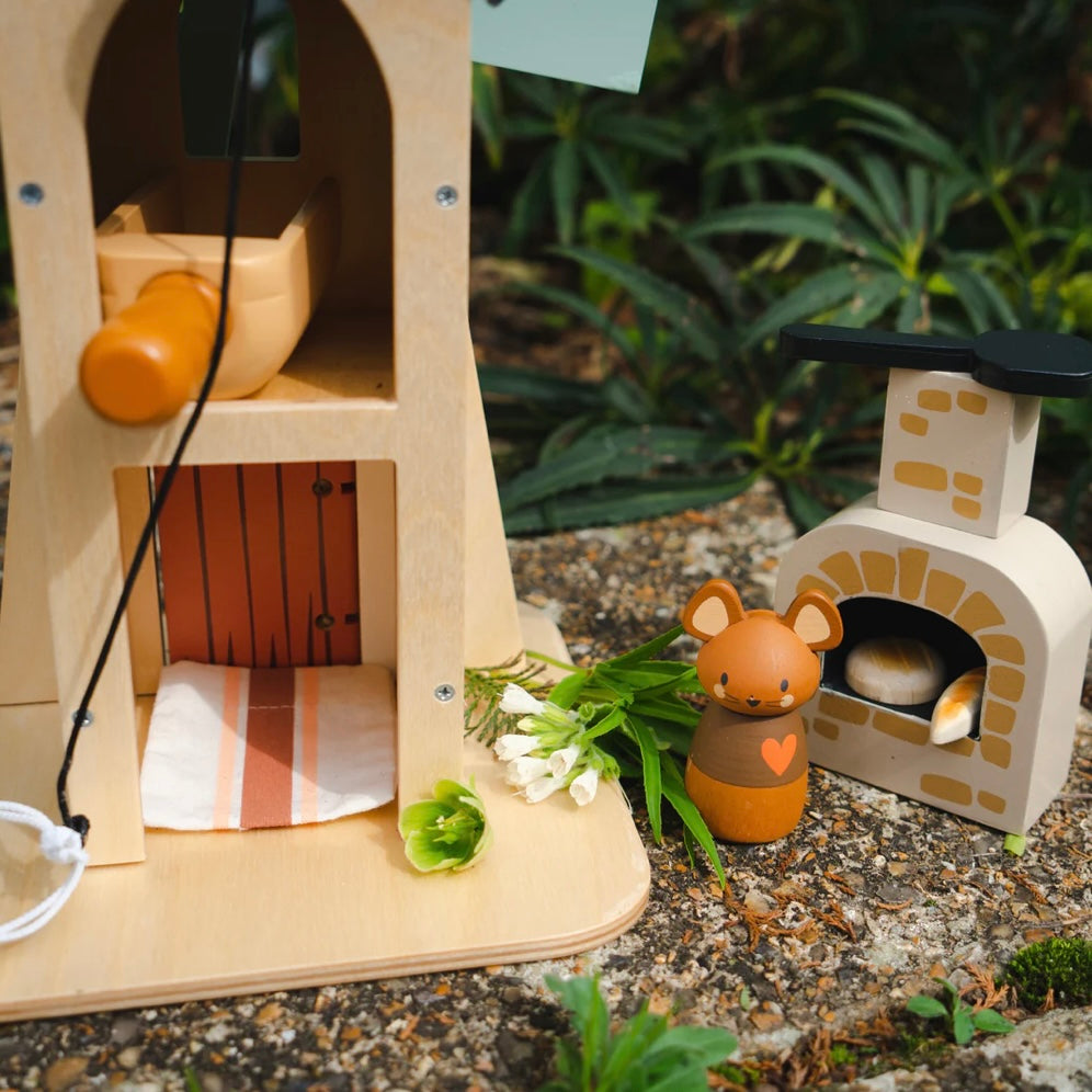 Close up of our Wooden Windmill showing the bread oven 
Play set for children 