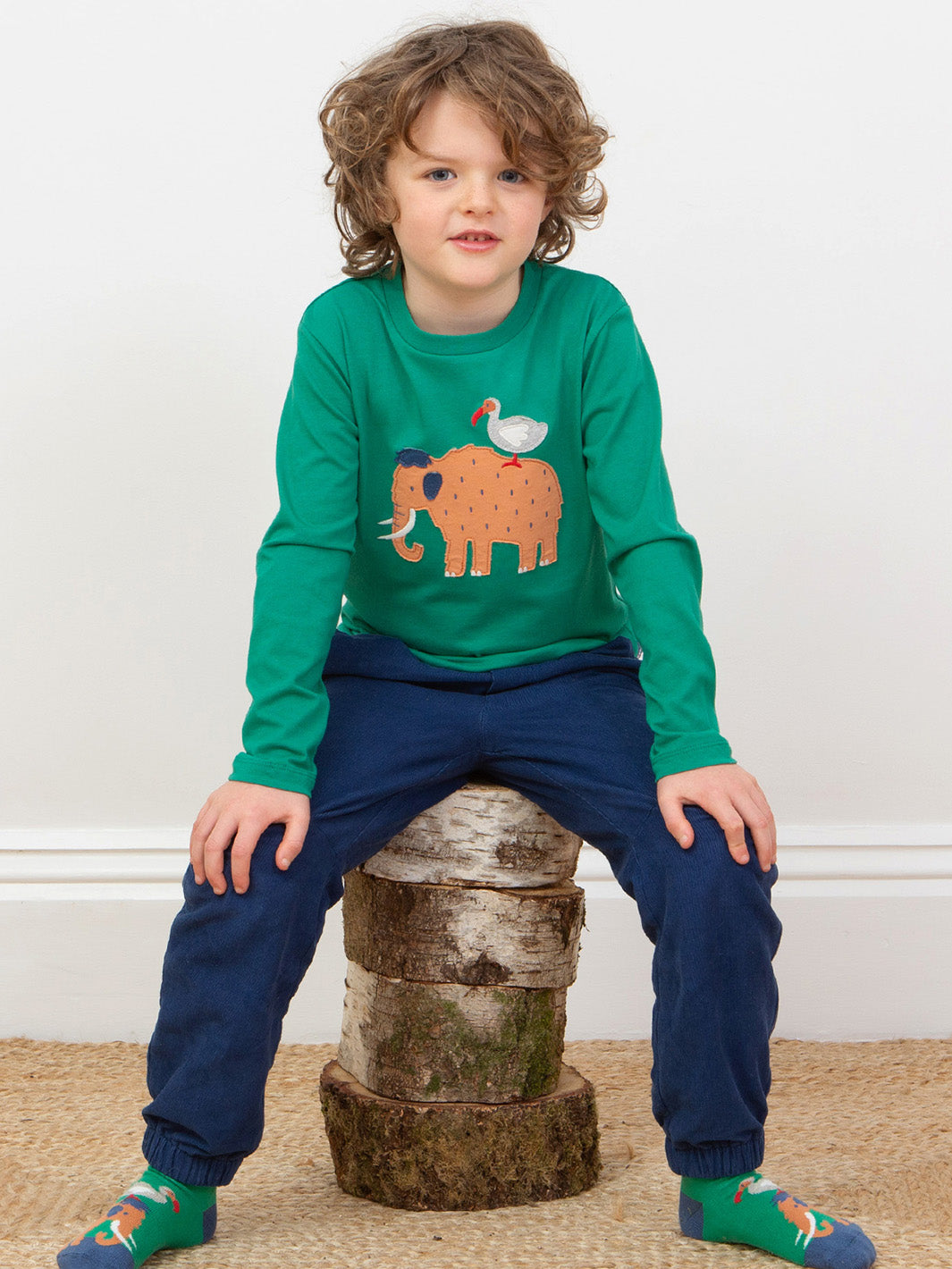 Child wearing our Woolly Mammoth T-Shirt and matching cosy cords